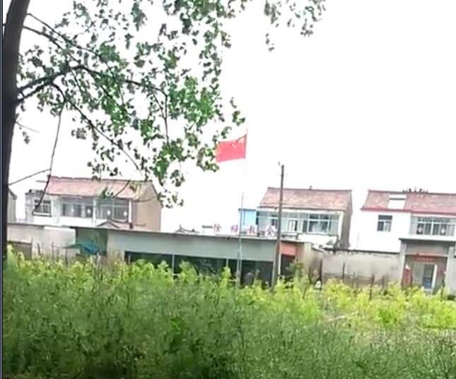 A national flag is raised in front of Xumei Church, a Three-Self Church in Wangying Town, Huai’an City.
