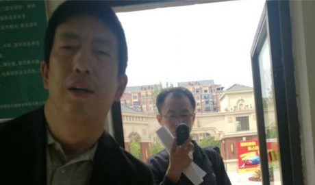 Two police officers from Tianjin ask Cheng Hai for evidence against Wang Quanzhang at his home in Hefei, April 26, 2018. Photo courtesy of Cheng Hai