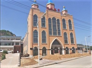 https://en.adhrrf.org/wp-content/uploads/2018/06/Piles-of-dirt-outside-the-new-church-in-Yingli.jpg