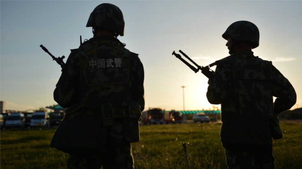 Staff Member of a Xinjiang Camp