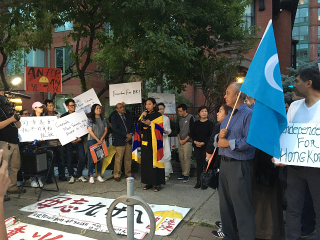 Chemi Lhamo, the president of the Student Union of the University of Toronto Scarborough Campus (UTSC), is speaking at the event. (Photo: ADHRRF)