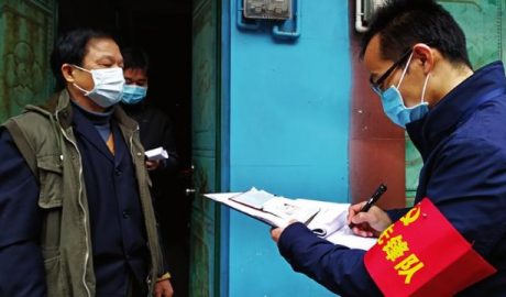 A grid administrator in the Wuming district of Nanning city in Guangxi Zhuang Autonomous Region registers residents’ information during the coronavirus epidemic.