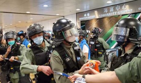 Hong Kong riot police on patrol during protest against National Anthem law, May 27, 2020.