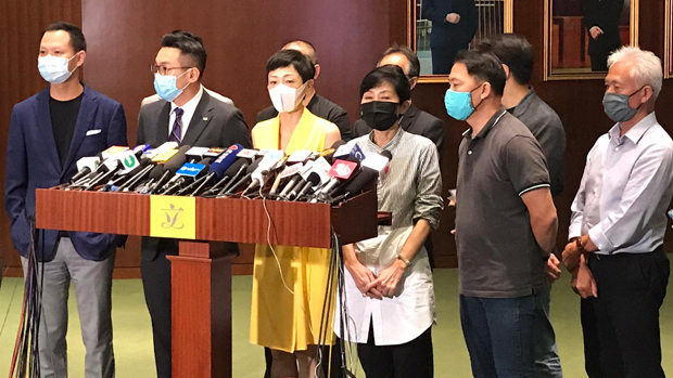 Chen Shuzhuang (in yellow dress), convenor of Hong Kong's Democratic Conference, says the city's 'one country, two systems' model has been sentenced to death by Beijing, May 28, 2020.