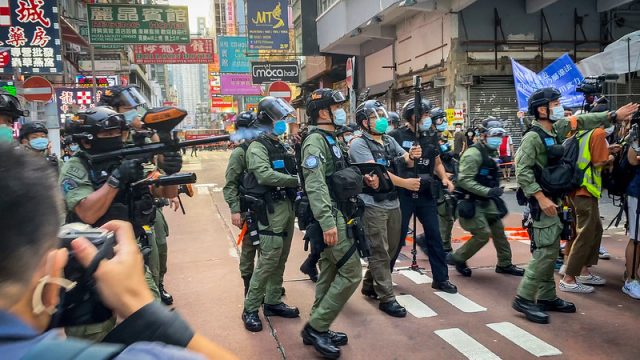 Thousands of riot police officers have been deployed in Hong Kong