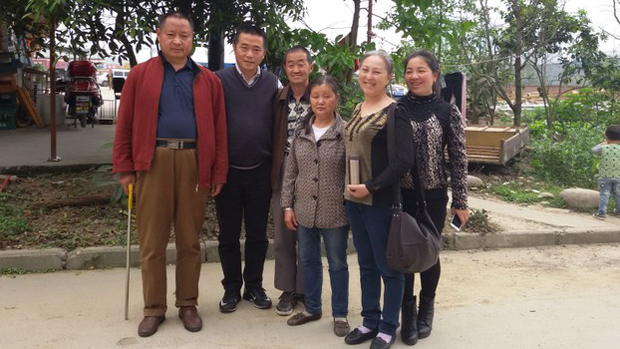 Huang Qi (second from left) and Yang Xiuqiong (second from right) are shown in an April 4, 2016 photo