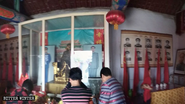 A temple in Henan’s Jiyuan city with a Mao Zedong statue and the ten grand marshals’ images.