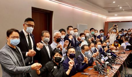 Hong Kong's pro-democracy legislators pose for a photo before a press conference at Legislative Council in Hong Kong