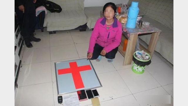 The police raid an Association of Disciples member’s home in Qinghai Province in September last year.