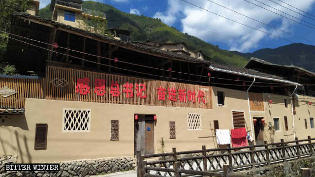 A slogan “Be Grateful to the General Secretary and Forge Ahead into a New Era” outside a Xiadang village resident’s house.