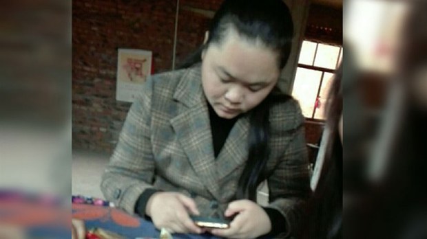 Dong Yaoqiong, who was released after being sent for "compulsory treatment" after she streamed live video of herself on July 4, 2018 splashing ink on a poster of President Xi in protest at "authoritarian tyranny," Jan. 3, 2020. 
